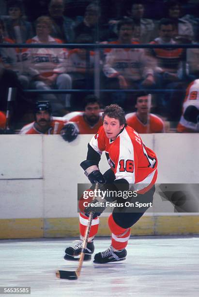 Bobby Clarke of the Philadelphia Flyers carries the puck against the Washington Capitals circa the 1970's during a game.