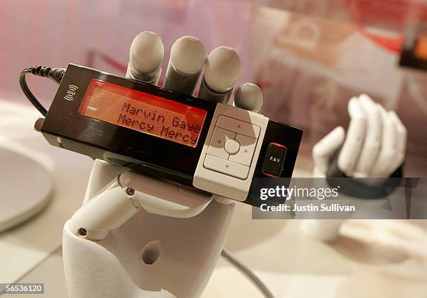 Portable XM satellite radio due to be released in March is seen on display on the second day of the 2006 Consumer Electronics Show January 6, 2006 in...