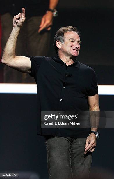 Actor/comedian Robin Williams jokes around during Google co-founder Larry Page's keynote address at the International Consumer Electronics Show...