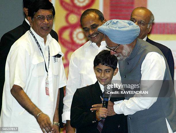 Indian Prime Minister Manmohan Singh greets Thailand-based Master Ajay Puri , a young web designer as Indian Minister for Overseas Indian Affairs,...
