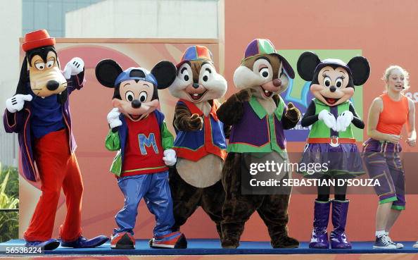 Disney Rapping Show Disney cartoon characters dance at a live performance for kids at a ...