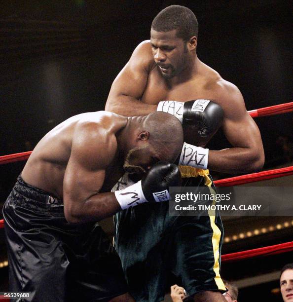 Champion O'Neil Bell from Jamaica and WBA and WBC cruiserweight champion Jean-Marc Mormeck fight in their 12-round cruiserweight championship fight...