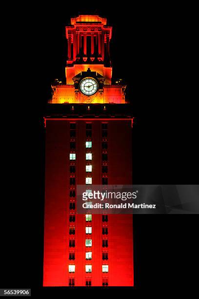 The University of Texas Tower is lit burnt orange with a number 1 in recognition of the Texas Longhorns national college football championship on...