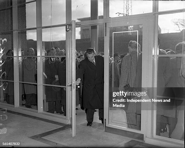 Opening of the Erne Hydro-Electric Scheme Ballyshannon, Mr Sean Lemass TD Opening the door of the Erne Hydro-Electric Power Station, . .