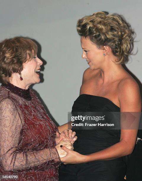 Honorees Shirley MacLaine and Charlize Theron onstage at the 17th Annual Palm Springs International Film Festival Gala at the Palm Springs Convention...