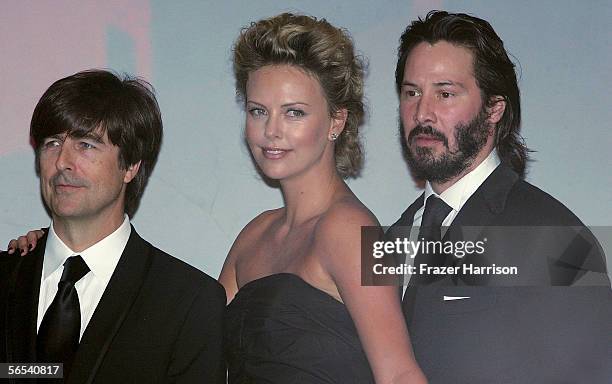 Composer Thomas Newman, actress Charlize Theron and actor Keanu Reeves onstage at the 17th Annual Palm Springs International Film Festival Gala at...