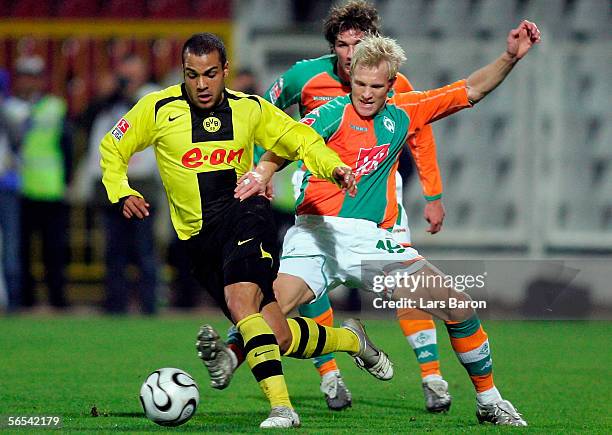 David Odonkor of Dortmund in action with Pekka Lagerblom of Bremen during the Efes Pilsen Cup match between Borussia Dortmund and Werder Bremen at...