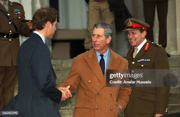 Prince William, accompanied by his father Prince Charles, Prince of Wales, is greeted by Major General Andrew Ritchie when he arrives to join his...