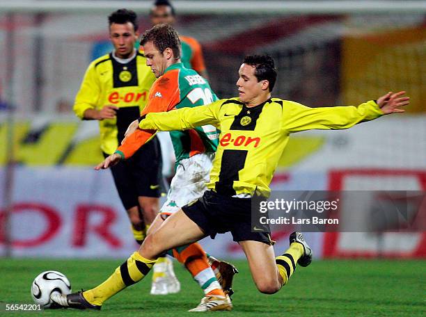 Philipp Degen of Dortmund challenges Daniel Jensen of Bremen during the Efes Pilsen Cup match between Borussia Dortmund and Werder Bremen at the...