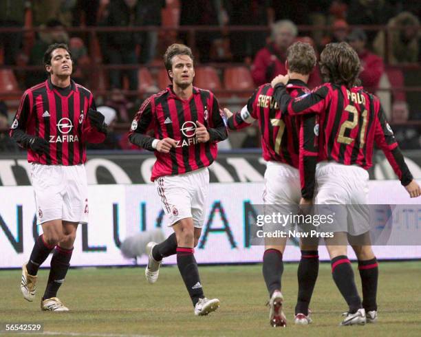 Milan players Kaka, Alberto Gilardino, Andrei Shevchenko and Andrea Pirlo celebrate their goal during the Serie A match between AC Milan and Parma at...