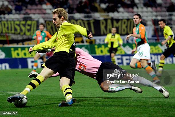 Florian Kringe of Dortmund in action with Goalkeeper Tim Wiese of Bremen during the Efes Pilsen Cup match between Borussia Dortmund and Werder Bremen...