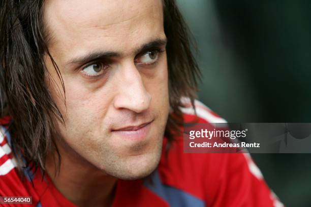Ali Karimi looks on during a press conference at the club's training camp on January 9, 2006 in Dubai, United Arab Emirates.