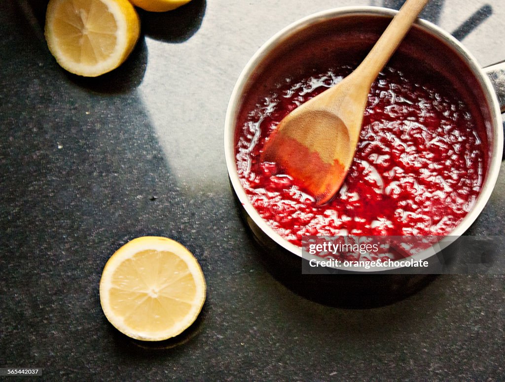 Preparing raspberry lemonade