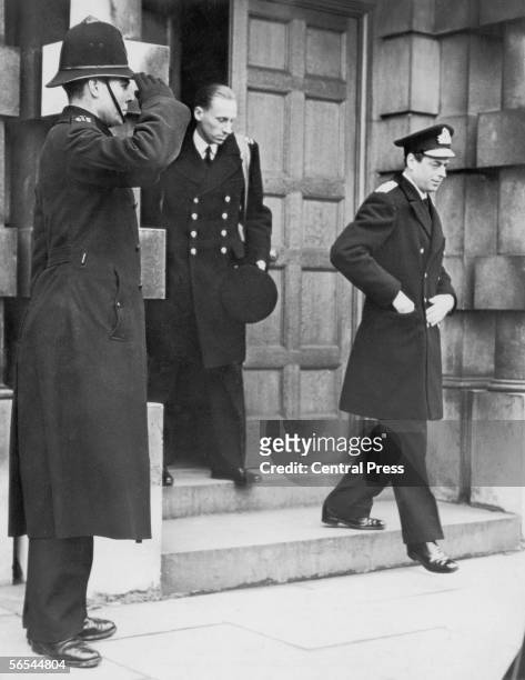 Prince George, the Duke of Kent leaves the Admiralty in London, accompanied by Lord Herbert, 26th January 1940. The Prince, who holds the rank of...