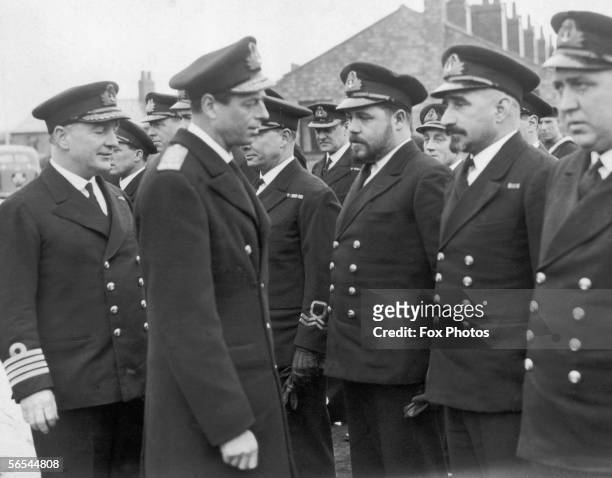 Prince George, the Duke of Kent presents Distinguished Service medals to a British submarine crew at an east coast port during World War II, 10th...
