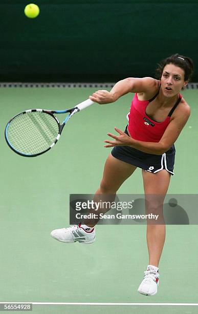 Nuria Llagostera Vives of Spain in action against Jelena Kostanic of Croatia during day three of the Sony Ericsson Moorilla International at the...