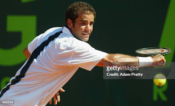 S Pete Sampras hits a backhand against Argentina's Guillermo Canas during the Arag World Team Cup in Dusseldorf Germany on May 21, 2002.