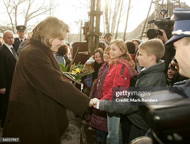 Belgian Royals Prince Philippe and Princess Matrhilde greet a well wisher at the APIDES factory, where they spent time at an enterprise scheme which...