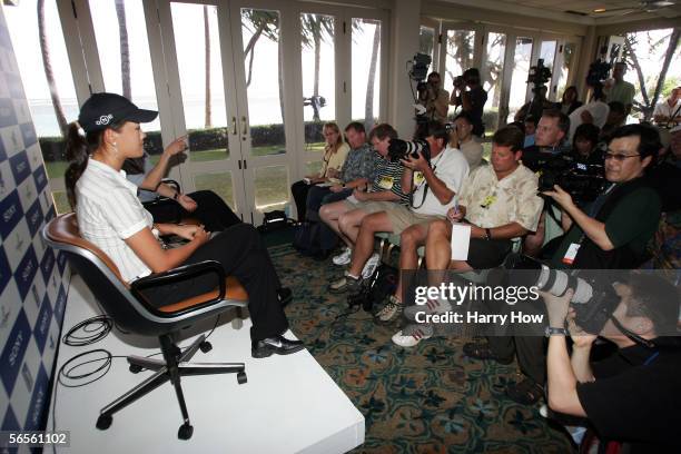 Michelle Wie addresses the media during a press conference after a practice round of the Sony Open at the Waialae Country Club on January 10, 2006 in...