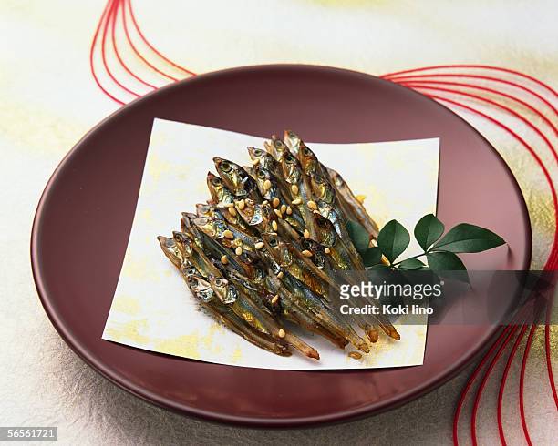 dried sardine - osechi ryori stock pictures, royalty-free photos & images