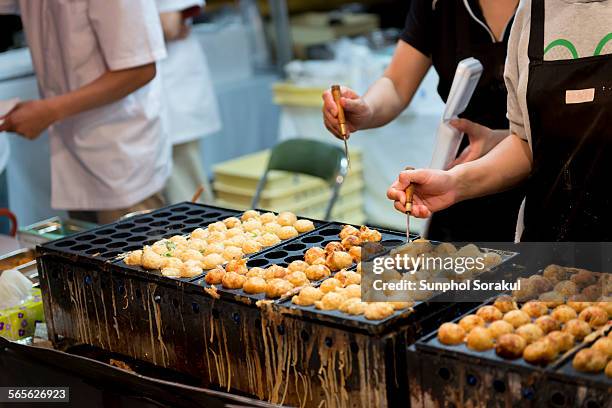 takoyaki at food stall - takoyaki stock pictures, royalty-free photos & images