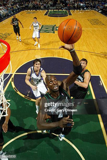 Kevin Garnett of the Minnesota Timberwolves grabs a rebound against the Milwaukee Bucks on January 10, 2006 at the Bradley Center in Milwaukee,...