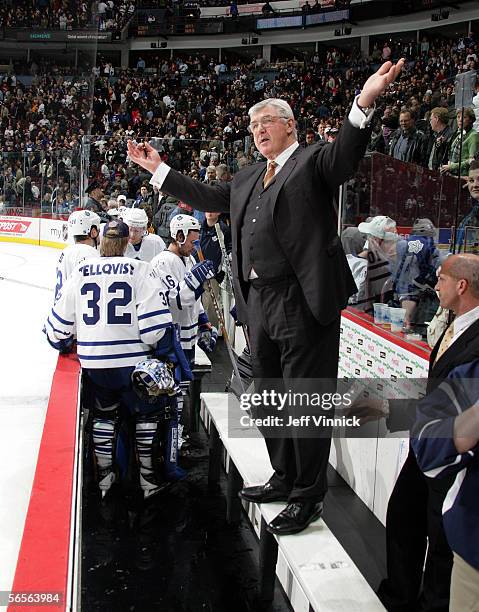 Toronto Maple Leaf head coach Pat Quinn complains to the referees at the end of their game against the Vancouver Canucks at General Motors Place on...
