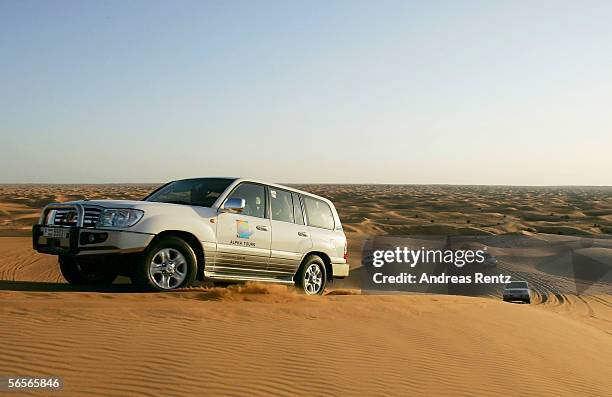 The players of Hansa Rostock travel by jeep during a desert tour on January 10, 2006 in Dubai, United Arab Emirates. The players of Rostock went off...