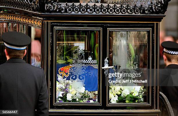 The hat of Police Constable Sharon Beshenivsky sits on her coffin during her funeral in Bradford on January 11, 2006 in Bradford, England. PC...