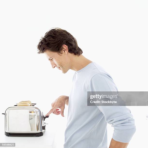 337 Guy Using Toaster Stock Photos, High-Res Pictures, and Images ...