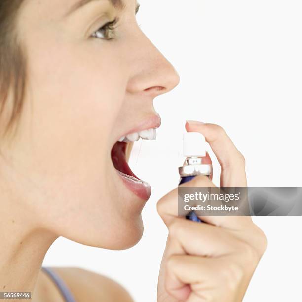 Using Mouth Spray 125 Dental Spray Stock Photos, High-Res Pictures, and Images - Getty Images