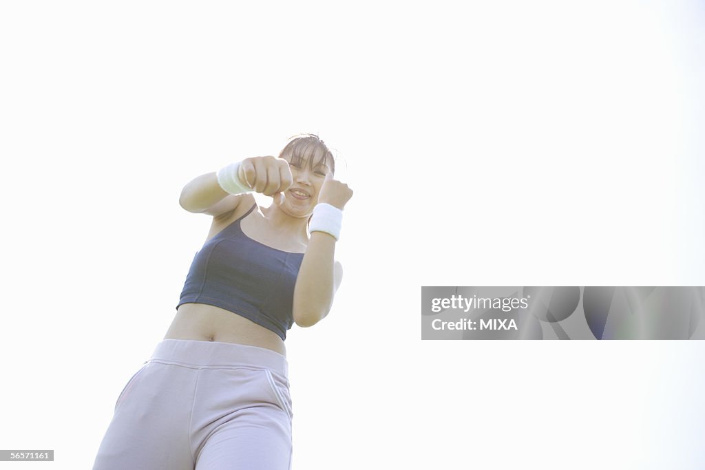 Young woman exercising