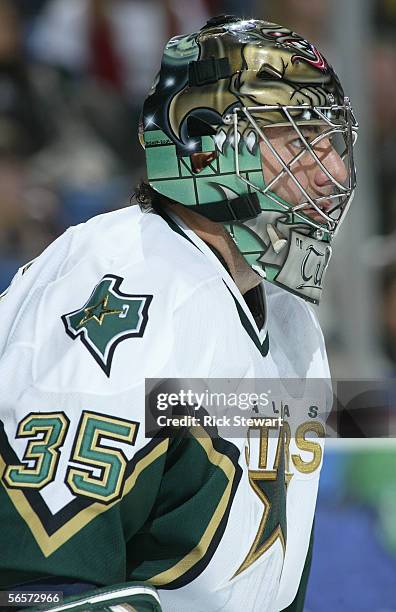 Goaltender Marty Turco of the Dallas Stars in action against the Buffalo Sabres during the NHL game on December 14, 2005 at HSBC Arena in Buffalo,...