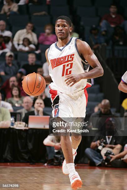 Kevin Burleson of the Charlotte Bobcats moves the ball against the Indiana Pacers at Charlotte Coliseum on November 16, 2005 in Charlotte, North...