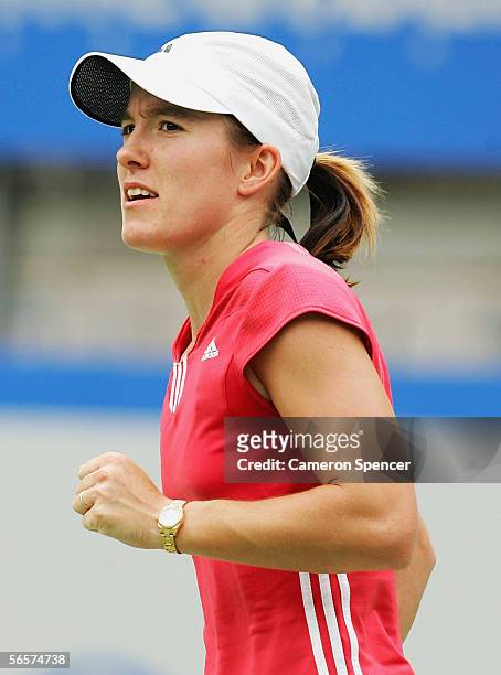 Justine Henin-Hardenne of Belgium celebrates a point during her match against Svetlana Kuznetsova of Russia during day five of the Medibank...