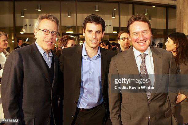 Producers Tom Rosenberg and Gary Lucchesi pose Screen Gems' Marc Weinstock with at the premiere of Screen Gems' "Underworld Evolution" at the...