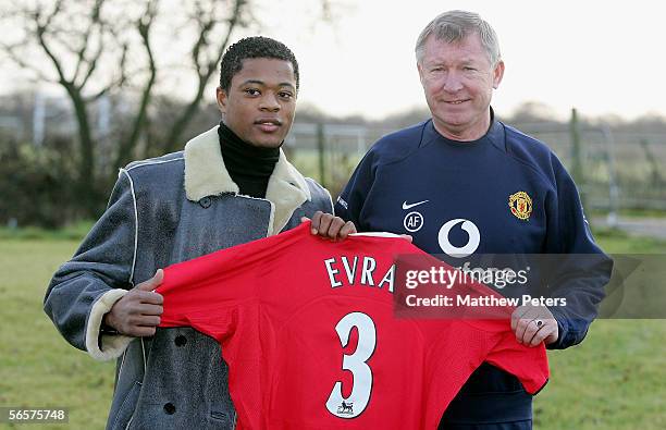 Sir Alex Ferguson of Manchester united poses with Patrice Evra ahead of the press conference to announce the signing of Patrice Evra at Carrington...