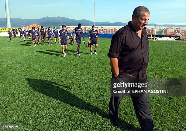 - Picture taken 27 June 2005 in Francois Coty stadium in Ajaccio shows French L1 football club Ajaccio's coach Rolland Courbis walking ahead of his...