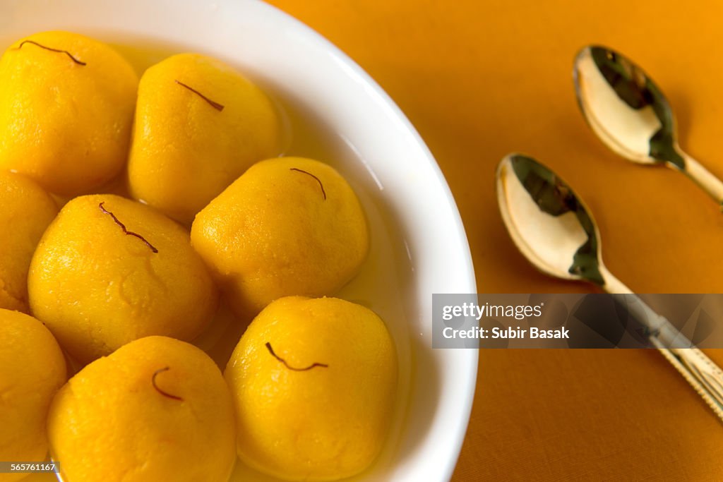 Kamala-bhog is orange flavored rasgullas.