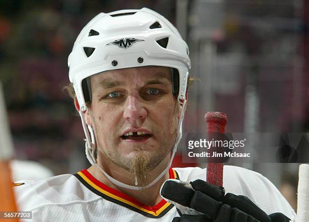 Darren McCarty of the Calgary Flames looks on during the game against the New Jersey Devils on December 7, 2005 at Continental Airlines Arena in East...