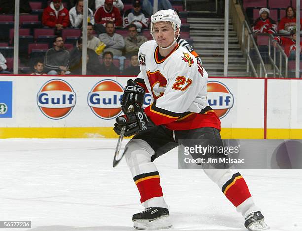 Steve Reinprecht of the Calgary Flames skates during the game against the New Jersey Devils on December 7, 2005 at Continental Airlines Arena in East...