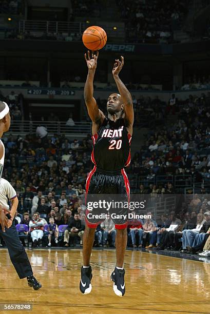 Gary Payton of the Miami Heat shoots during the game against the Milwaukee Bucks on December 14, 2005 at the Bradley Center in Milwaukee, Wisconsin....