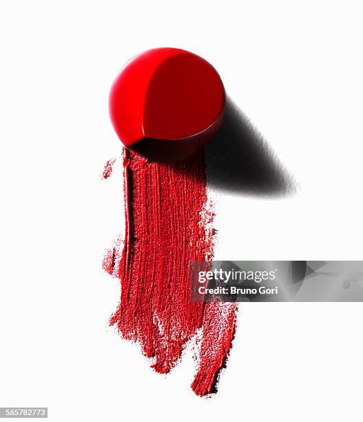 abstract of piece of red lipstick and smudged line - lipstick imagens e fotografias de stock