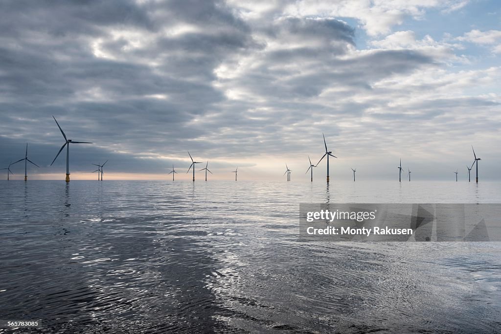 View of offshore windfarm from service boat at sea