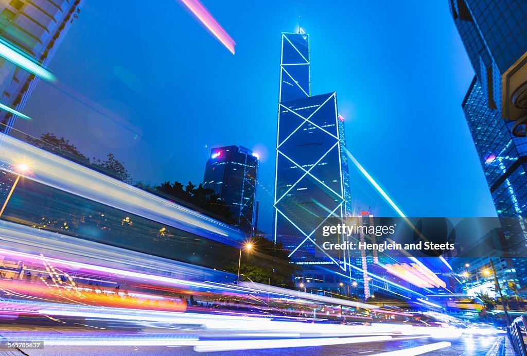 Central Hong Kong business district: skyline with Bank of China building and light trails at dusk, Hong Kong, China
