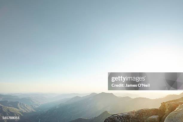 sunset over valley hills - mountain range 個照片及圖片檔