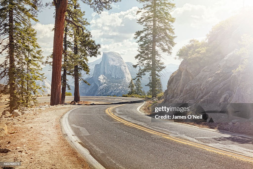 Winding road with half dome in yosemite