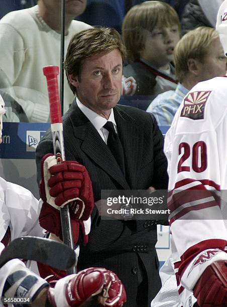 Wayne Gretzky, head coach of the Phoenix Coyotes watches play against the Buffalo Sabres on January 12, 2006 at HSBC Arena in Buffalo, New York.