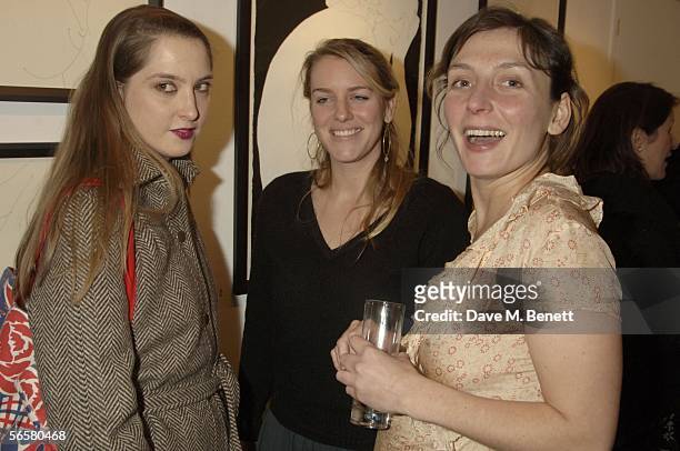 Daisy De Villeneuve, curator Laura Parker-Bowles and artist Natasha Law, Jude Law's sister, attend the private view for her new exhibition "Hold" at...