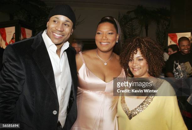 Actor LL Cool J and his wife Simone pose with actress Queen Latifah at the premiere of Paramount Pictures "Last Holiday" at the Cinerama Dome Theater...